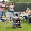 A Foldable Outdoor BBQ Portable Grilling Table with Windscreen Bag