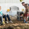 A Foldable Outdoor BBQ Portable Grilling Table with Windscreen Bag